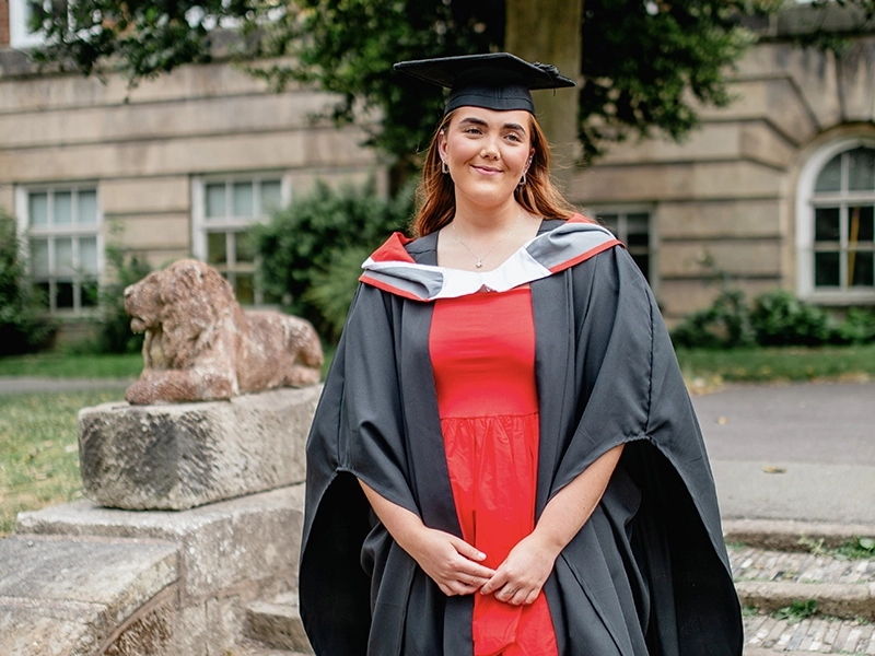 Student sawing metal