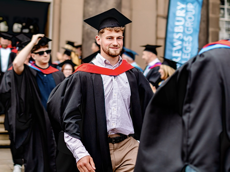 Student sawing metal