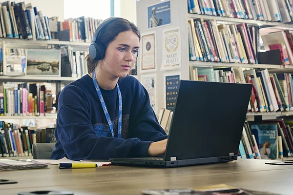 Student on laptop in the LRC