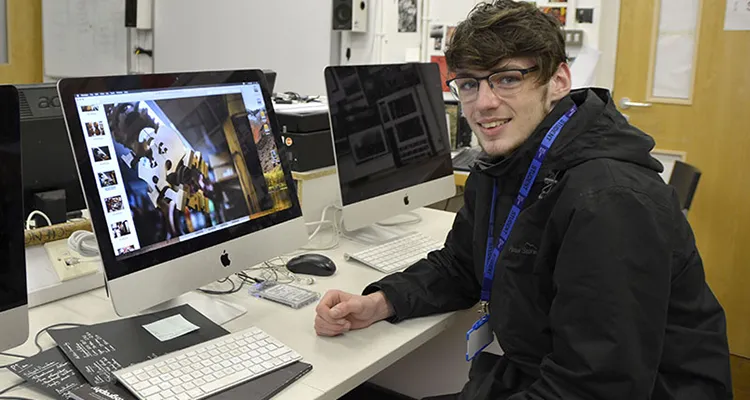 Student sitting in front of PC