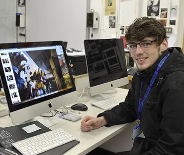 Student sitting in front of PC
