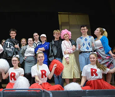 Students dressed as members of the cast from Grease