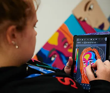 Student uses tablet to create digital image